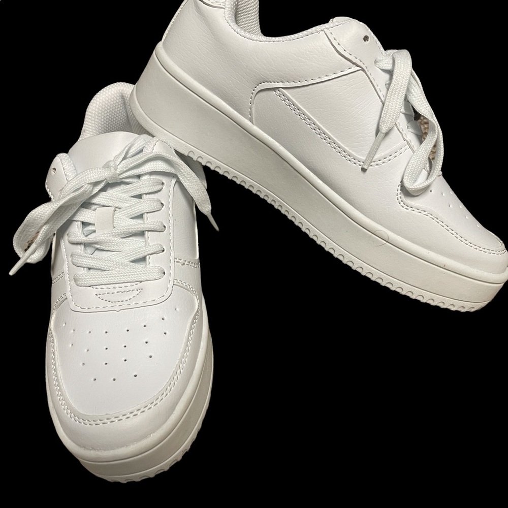 Plataform sneakers with memory foam. Worn only inside to try them on. Like new!